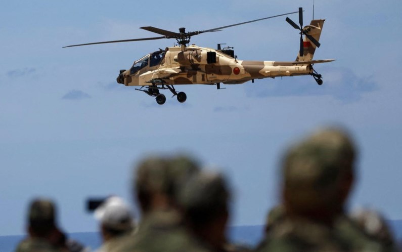 Trump says US pilots OK after helicopter crashed near Strait of Hormuz.