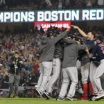 The Red Sox set a franchise record by winning 15 straight games before losing the nightcap of their doubleheader against the Orioles..