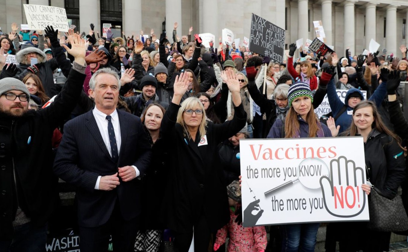 RFK Jr. faults Fauci's COVID-19 handling while promoting the standard measles vaccination.