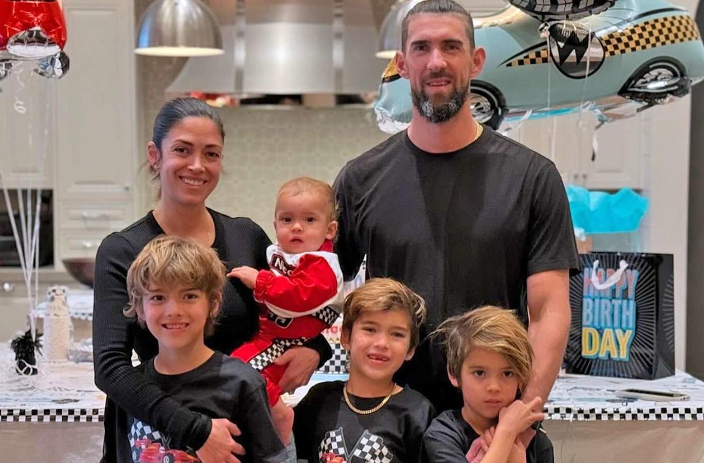 Four youngsters are being raised by Michael Phelps. This is how he guides people through big emotions.