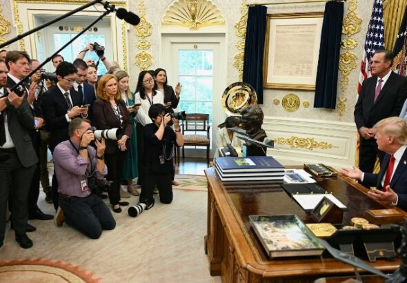 Judge temporarily blocks Trump ban on