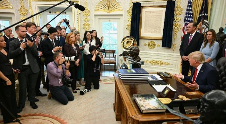 Judge temporarily blocks Trump ban on