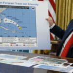 President Trump appears surprised by Hurricane Isaias news before Alabama trip.