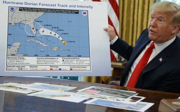 President Trump appears surprised by Hurricane Isaias news before Alabama trip.