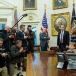 Trump confronts reporter in tense Oval Office exchange.