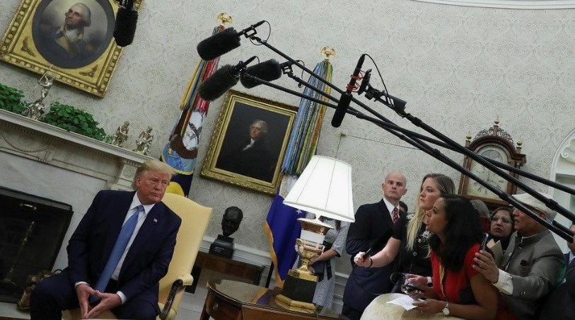 Trump confronts reporter in tense Oval Office exchange