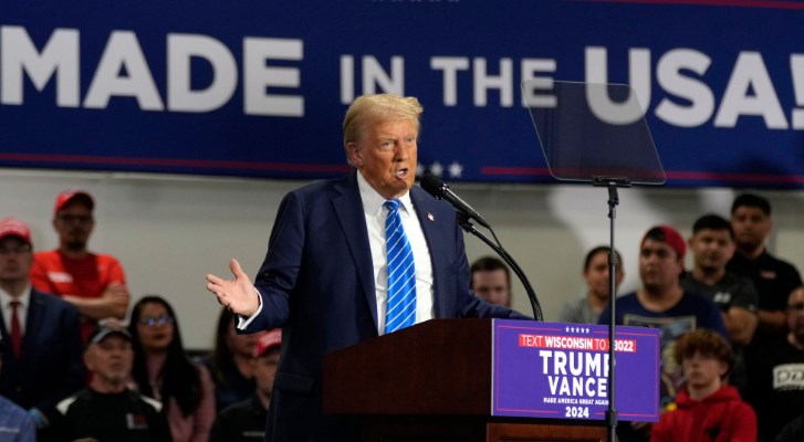 Trump says checks to voters are from economic growth